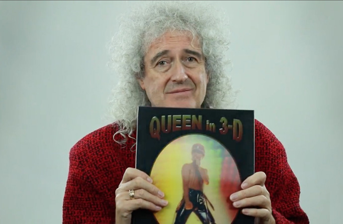 Brian shows Queen In 3-D book