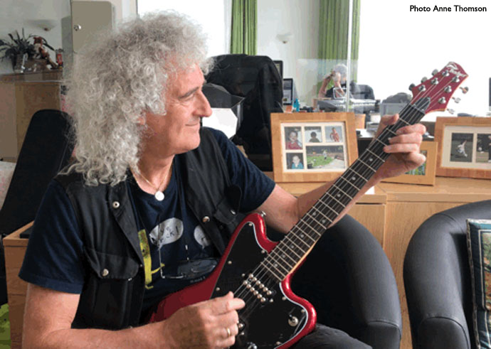 Brian May signed guitars to benefit badgers