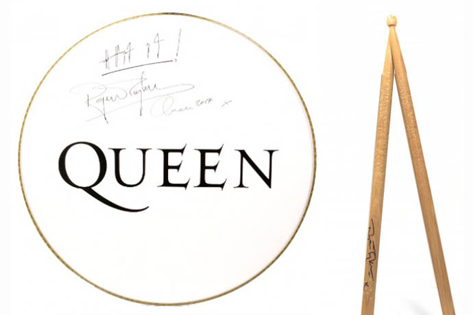 Auction - Roger Tayolor signed drum head and sticks
