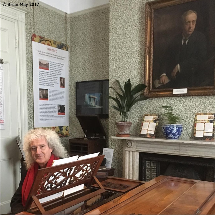 Bri sitting at Gustav Holst's piano