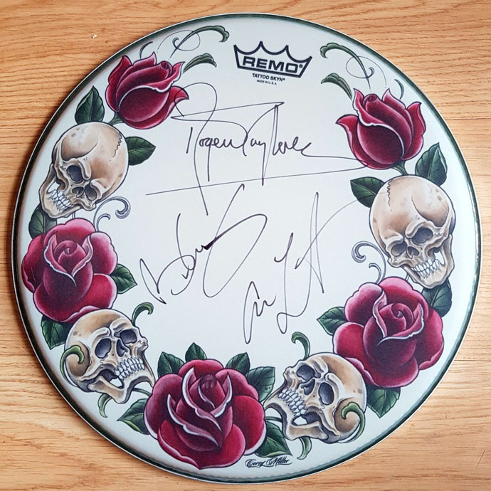 Remo drumhead signed Manchester by Brian, Roger, Adam for chART