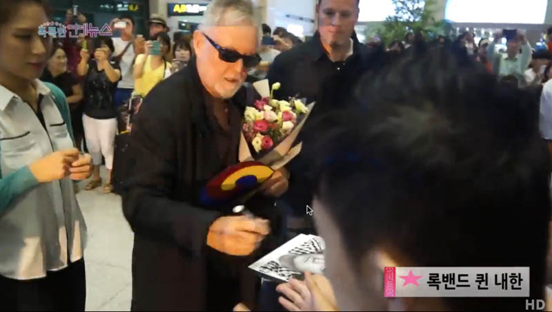 Roger Taylor Korea airport arrival