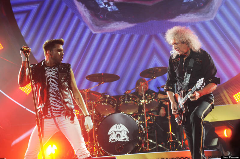 Lambert performs alongside Brian May