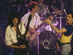 Queen on stage in 1986 by Dave HoganQueen performing in 1986 - (L-R) Brian May, John Deacon, Roger Taylor and Freddie Mercury [DAVE HOGAN]