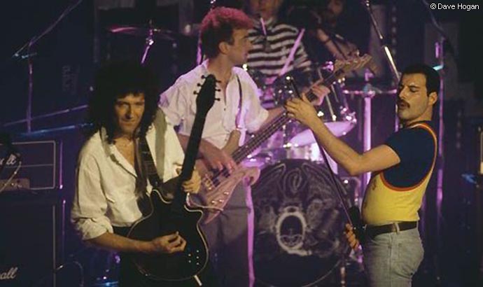 Queen on stage in 1986 by Dave HoganQueen performing in 1986 - (L-R) Brian May, John Deacon, Roger Taylor and Freddie Mercury [DAVE HOGAN]