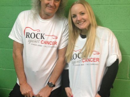 Brian and Kerry show Rock Against Cancer shirts