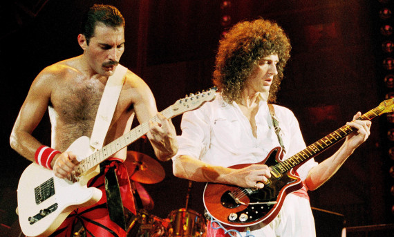 Freddie and Brian playing guitars