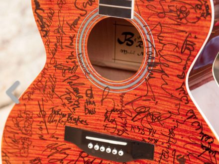 Signed guitar for baby unit