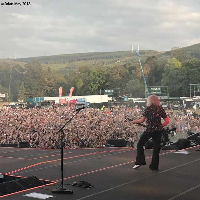 Bri with jolly Dubliners - hills backdrop