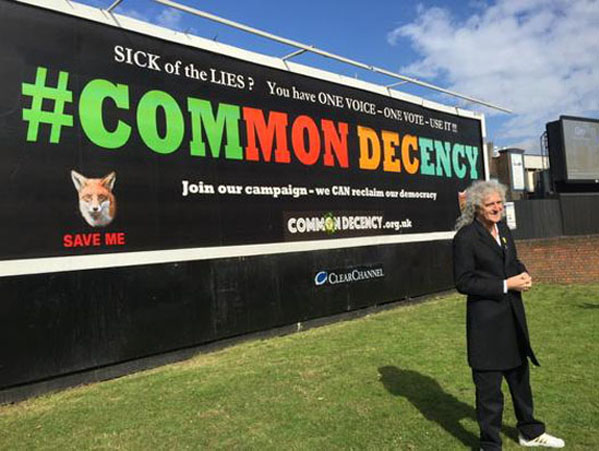 Brian with Common Decency billboard