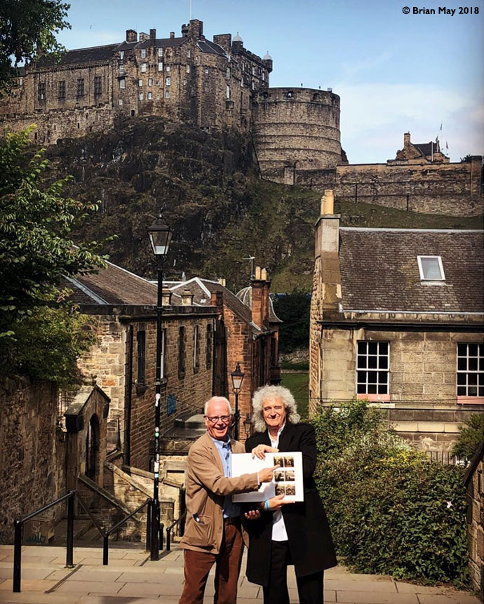 Prof Taylor and Bri with book in Edinburgh street