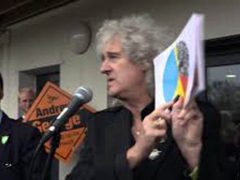 Andrew George and Brian May with pie chart