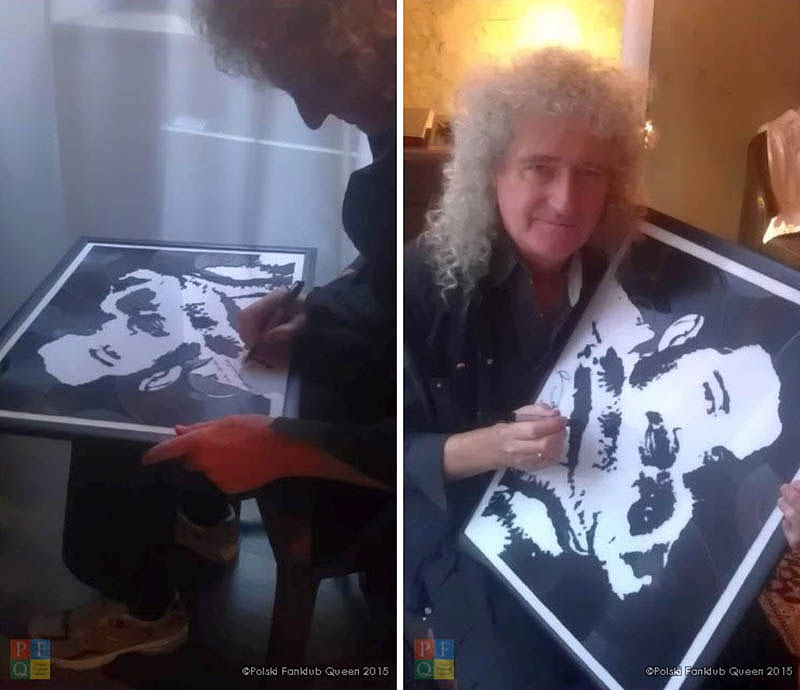Brian May signing Freddie cat painting