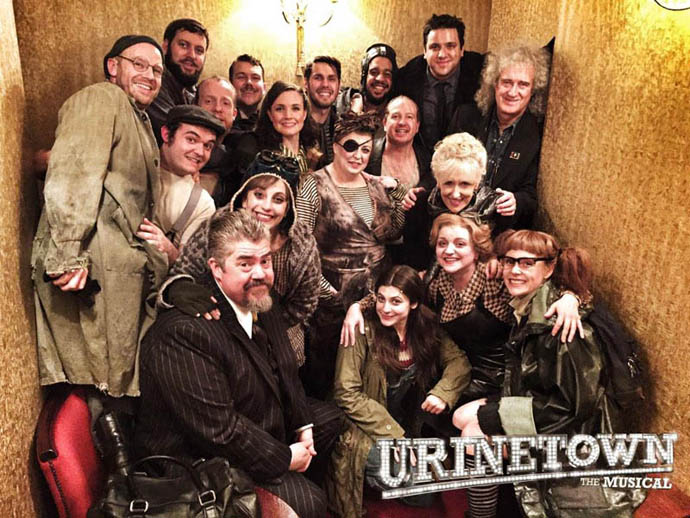 Brian and Anita with cast of Urinetown