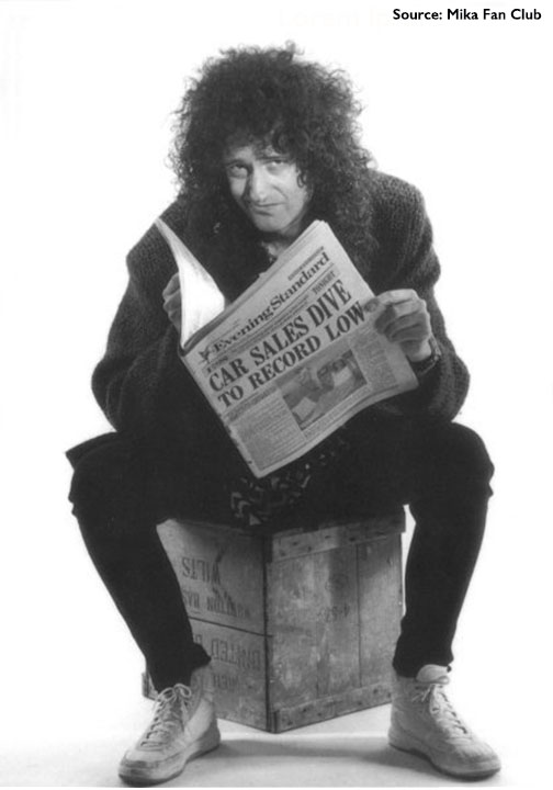 Brian May: Driven By You [reding newspaper] Source: Mika Fan Club