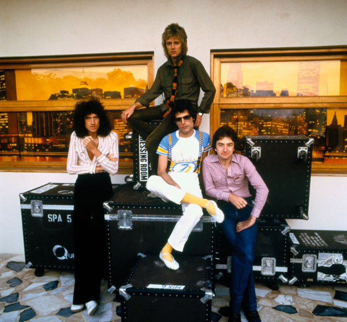 Queen - seated on stage boxes