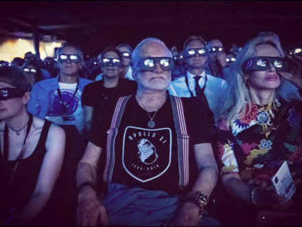 Buzz Aldrin watches Mission Moon 3-D presentation by Brian and David Eicher