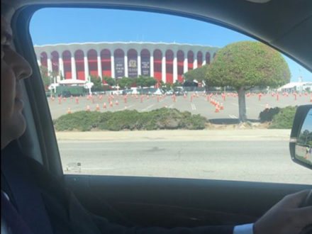 Bri driving into The Forum, LA