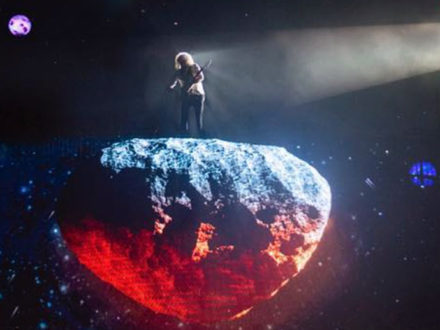 Bri on an asteroid - close up - by Ric Lipson