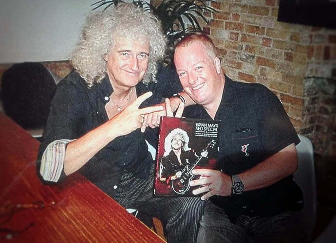 Brian May and Simon Bradley with Red Special book