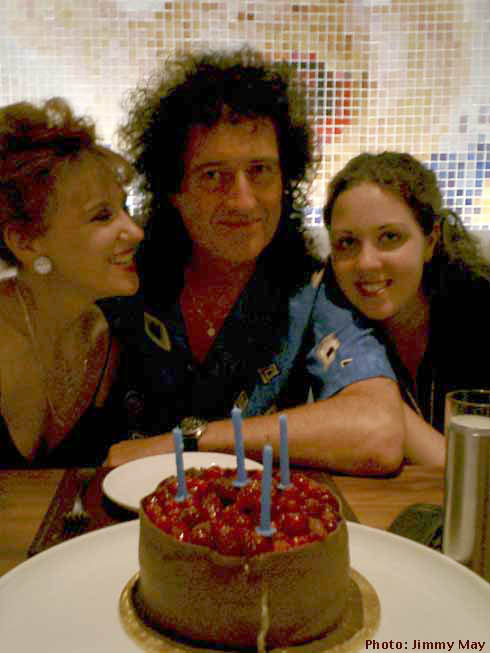Brian with birthday cake, Anita and Emily