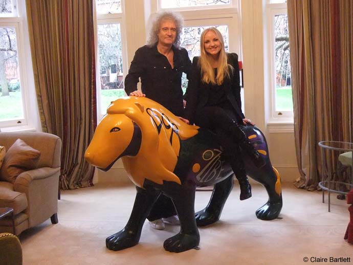 Brian and Kerry with lion - photo shoot
