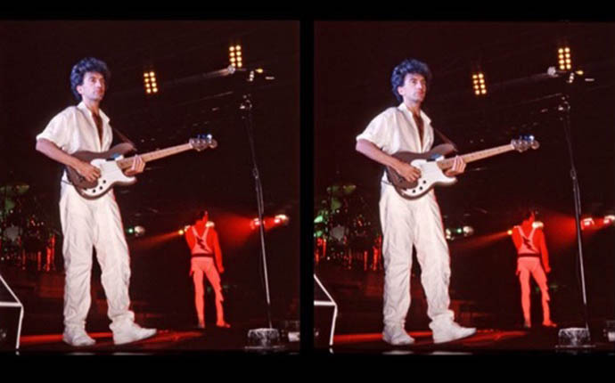 John Deacon and Freddie on stage