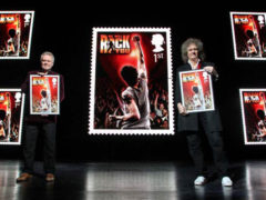 Brian May and Roger Taylor show We Will Rock You Stamp