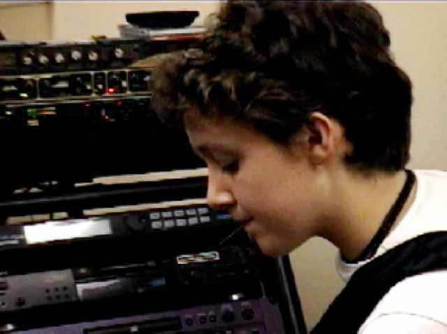 Vicki playing guitar