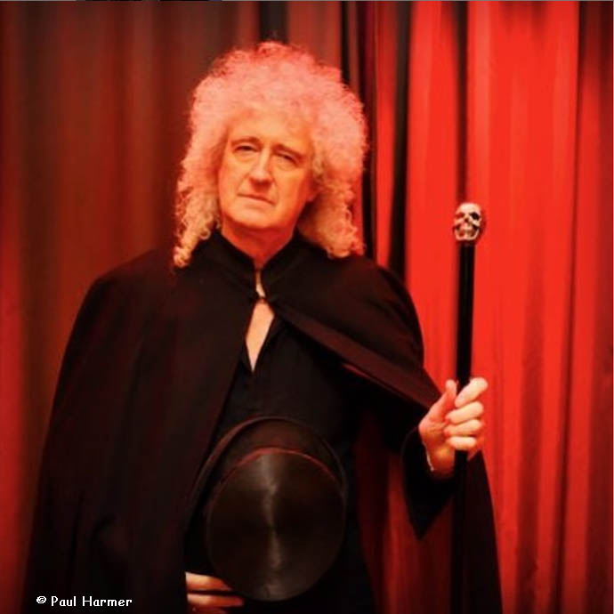 Bri with cloak and cane - by Paul Harmer