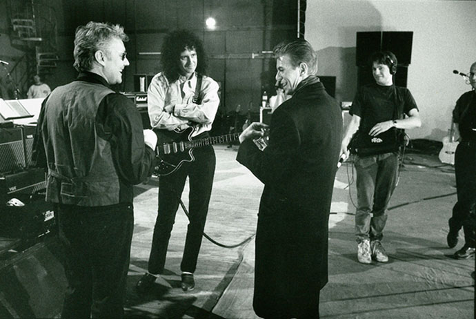 David Bowie with Roger Taylor and Brian May