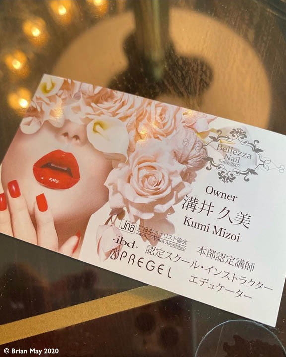 Kumi Mizoi business card
