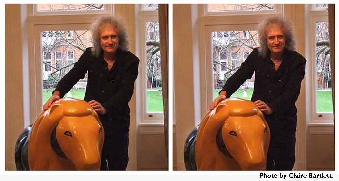 Bri practises Phrenology on the Lion.   Stereo photo by Claire Bartlett. 