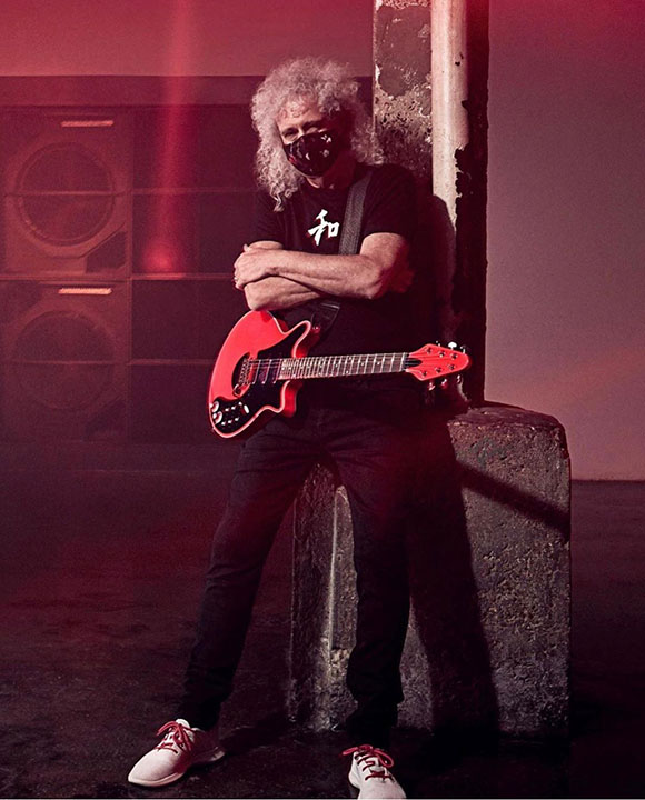 Bri with Pink guitar - arms folded