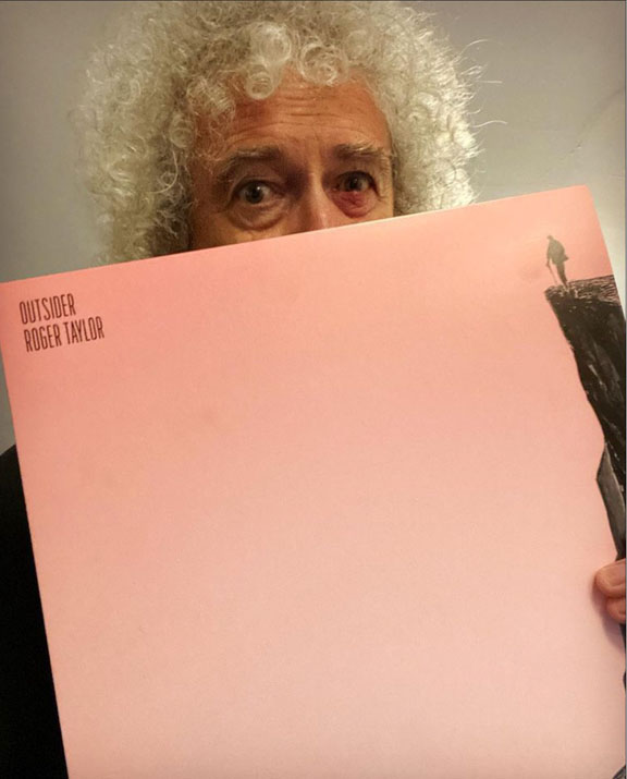 Brian with Roger Taylor's album