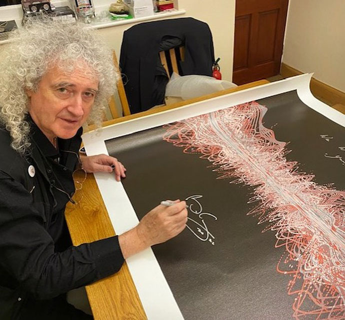Brian signing artwork