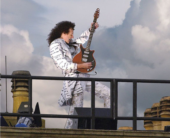 Brian May on Buckingham Palace Roof by Arthur Edwards