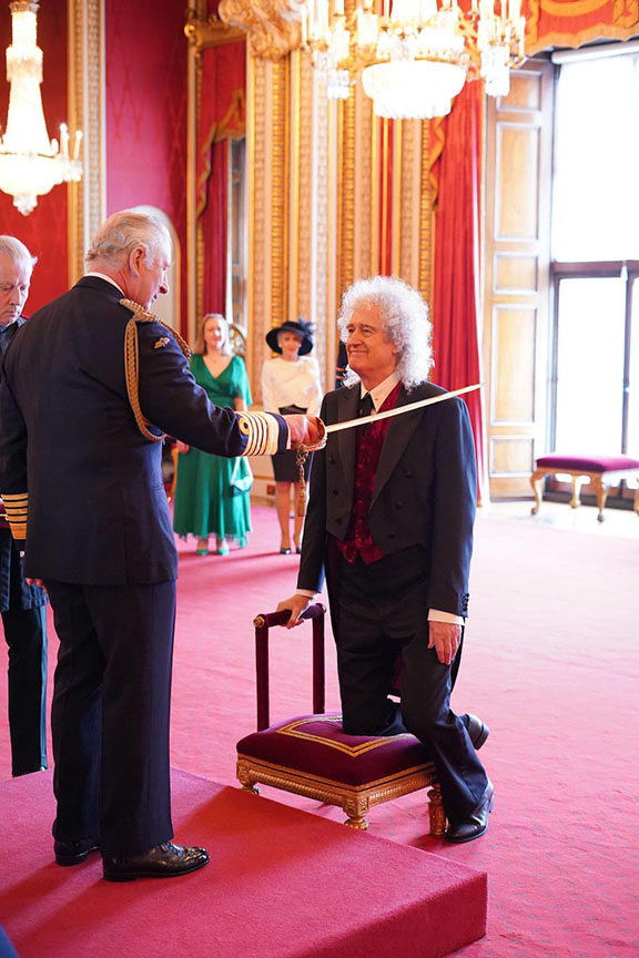 Brian May receives knighthood from King Charles