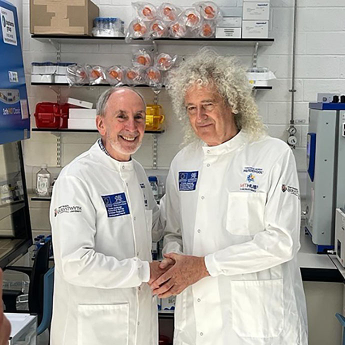 Prof Glyn Hewinson, and Brian May, Abersytwyth University Laboratories