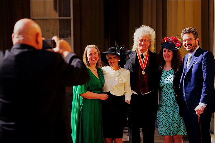 Phil Webb taking photo of May family, Buckingham Palace