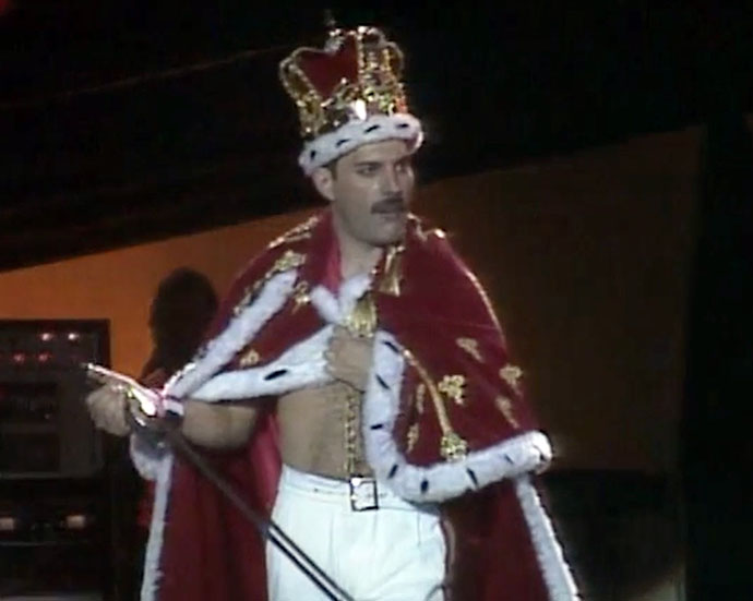 Freddie in crown and robe