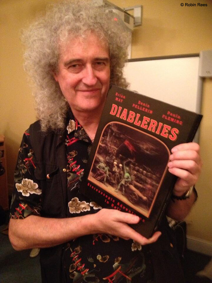 Brian May with first copy Diabelries book